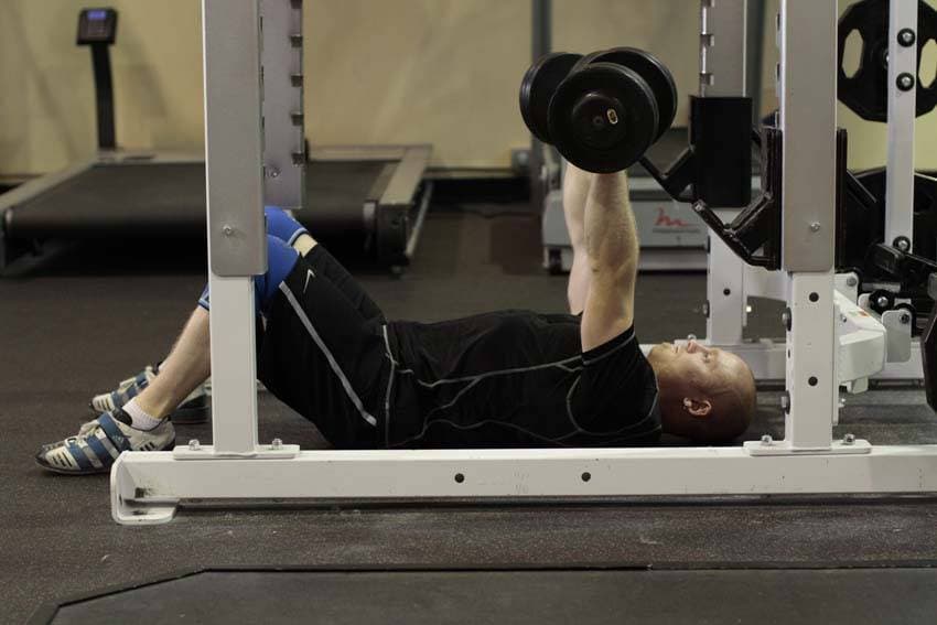 Dumbbell floor press, position 1