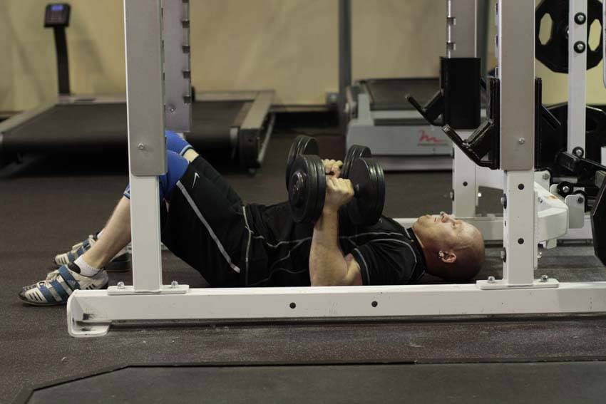 Dumbbell floor press, position 2