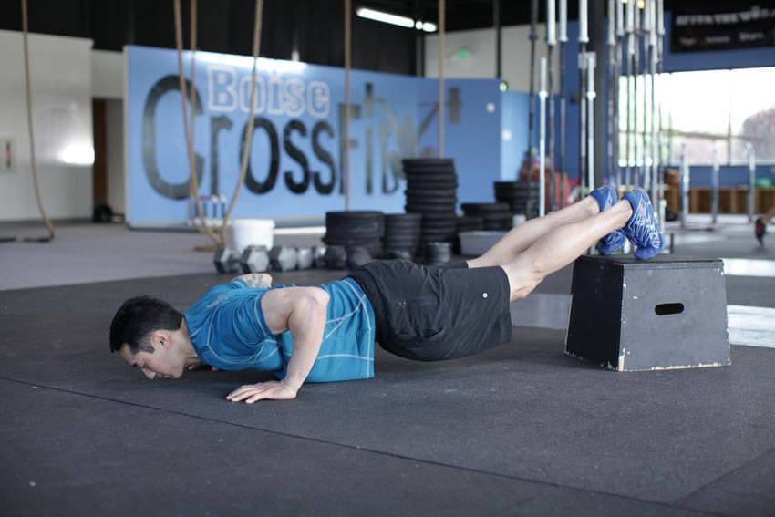 Feet-elevated push-up, position 2